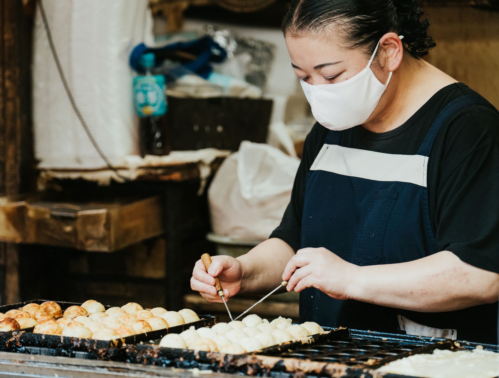 Okonomiyaki and Takoyaki: The Dishes That Define a City