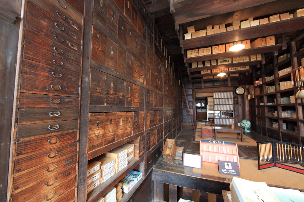 Shelves of neatly arranged Japanese stationery, planners, pens, and paper goods.